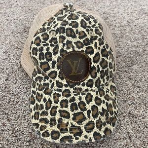 LV embossed leopard hat- used
